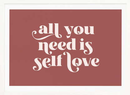 A framed art print with a dusty rose background. In the center, the phrase 'all you need is self love' is written in a creamy white, stylized, retro font. The artwork is enclosed in a simple silver frame. Decor