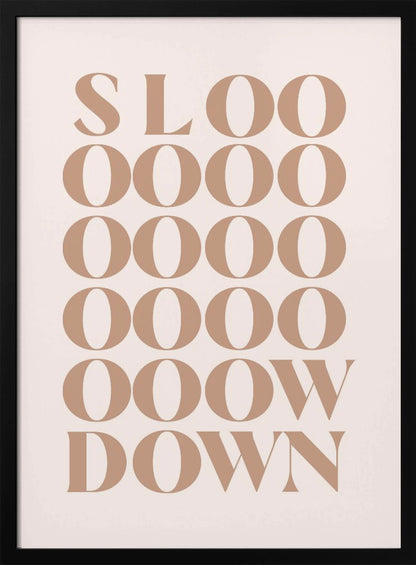 A minimalist art print with the phrase 'Slow Down' in a brown serif font against a pale pink background. The word is styled vertically, with 'SLOO' on the top line, followed by multiple lines of 'OOOO', and ending with 'OOW' and 'DOWN', visually stretching the word to emphasize the message. Artwork