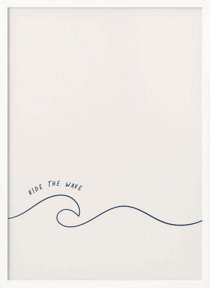 A minimalist art print in a black frame featuring a single dark blue line that forms a simple ocean wave on an off-white background. The words 'RIDE THE WAVE' are written in a casual, handwritten font above the crest. Wall Art