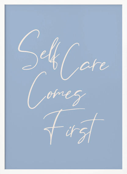 A framed poster featuring the phrase 'Self Care Comes First' in an elegant, off-white cursive font against a solid light blue background. The artwork is enclosed in a simple black frame. Decor
