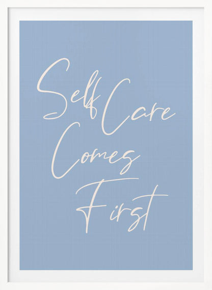 A framed poster featuring the phrase 'Self Care Comes First' in an elegant, off-white cursive font against a solid light blue background. The artwork is enclosed in a simple black frame. Decor