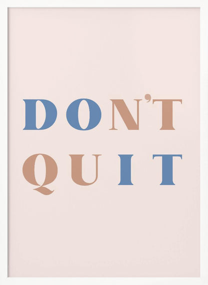 A minimalist motivational art print with a pale pink background and a thin black frame. The text reads 'DON'T QUIT' in a large serif font, with the words 'DO' and 'IT' highlighted in blue and the words 'N'T' and 'QU' in a muted terracotta color, creating a hidden 'DO IT' message. Decor