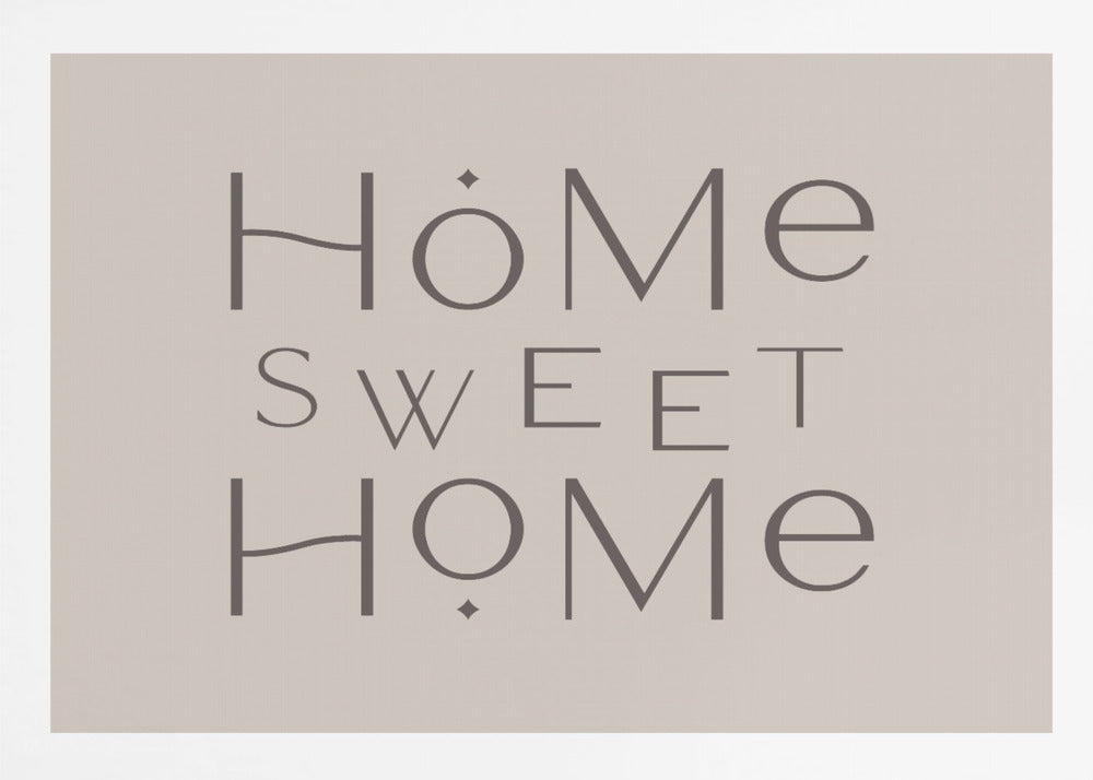 A minimalist wall art piece with the words 'Home Sweet Home' in a dark gray, stylized sans-serif font against a light beige background, all housed within a simple silver frame. Decor
