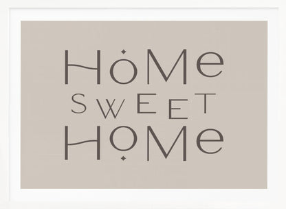 A minimalist wall art piece with the words 'Home Sweet Home' in a dark gray, stylized sans-serif font against a light beige background, all housed within a simple silver frame. Decor