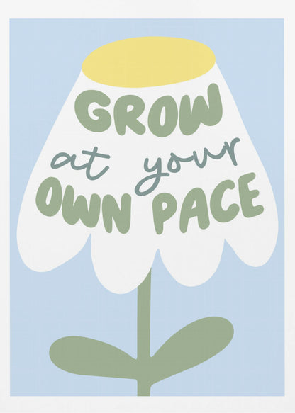 A motivational art print featuring a stylized white flower with a yellow center and green stem against a light blue background. The phrase 'GROW at your OWN PACE' is written in green, hand-drawn lettering across the flower's petals. Artwork