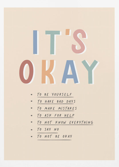 An inspirational framed poster with the words 'IT'S OKAY' in large, colorful letters. Below is a list of affirmations including 'TO BE YOURSELF', 'TO HAVE BAD DAYS', and 'TO MAKE MISTAKES' on a beige background. Artwork