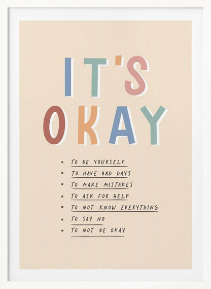 An inspirational framed poster with the words 'IT'S OKAY' in large, colorful letters. Below is a list of affirmations including 'TO BE YOURSELF', 'TO HAVE BAD DAYS', and 'TO MAKE MISTAKES' on a beige background. Artwork