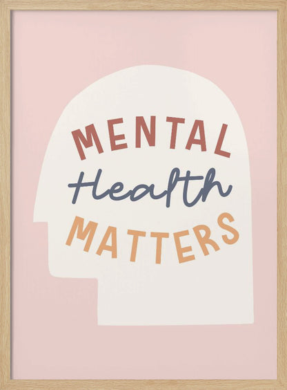 An inspirational art print with a light pink background featuring a cream-colored silhouette of a human head. Inside the silhouette, the phrase 'MENTAL Health MATTERS' is written in three different colors and fonts: rust red, slate blue script, and light orange. Wall Art