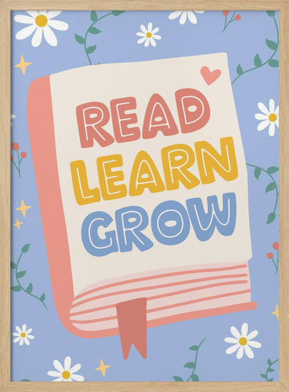 A cheerful illustration of an open book with the words 'READ LEARN GROW' written in colorful, playful letters. The background is light blue with white daisies, green vines, and yellow sparkles, creating a positive and educational theme. Poster