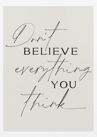 A minimalist art print with a thin black frame, featuring the quote 'Don't believe everything you think' in a mix of elegant script and serif fonts on a light beige background. Wall Art