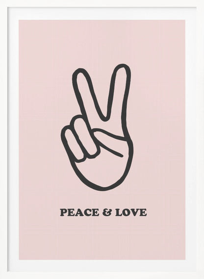 A minimalist art print with a light pink background featuring a bold black outline of a hand making a peace sign. Below the hand, the words 'PEACE & LOVE' are printed in a black serif font. The print is enclosed in a simple black frame. Print