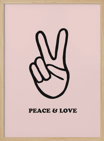 A minimalist art print with a light pink background featuring a bold black outline of a hand making a peace sign. Below the hand, the words 'PEACE & LOVE' are printed in a black serif font. The print is enclosed in a simple black frame. Print