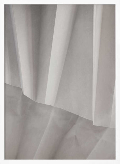 Abstract art print of folded white fabric or paper creating soft lines and deep shadows.