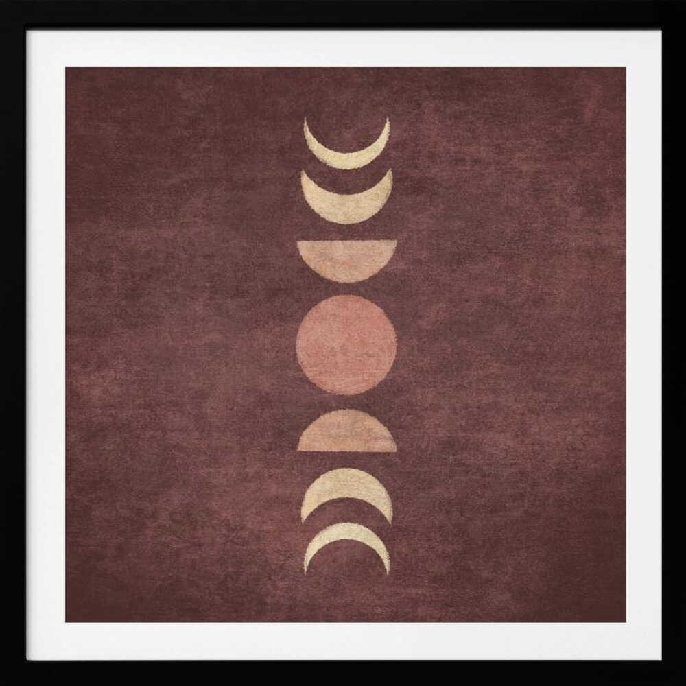 A minimalist piece of framed art showing the phases of the moon arranged vertically against a textured, deep maroon background. The moon shapes are colored in shades of cream and dusty rose, with the full moon in the center. Print