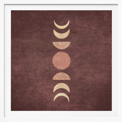 A minimalist piece of framed art showing the phases of the moon arranged vertically against a textured, deep maroon background. The moon shapes are colored in shades of cream and dusty rose, with the full moon in the center. Print