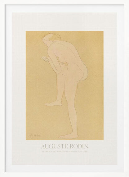 An art print of a sketch by Auguste Rodin titled 'Figure Bending Forward with Right Knee Raised'. The minimalist line drawing depicts a nude figure against a warm, yellow-beige background, matted in white and set in a simple black frame. Print
