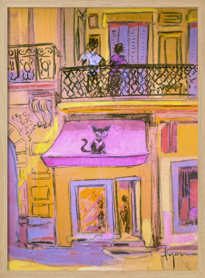 An impressionistic painting of a city street scene with a warm, yellow building. A stylized black cat with large eyes sits on a bright pink awning above a shop window. On the balcony above, two figures stand behind a black wrought-iron railing. Artwork