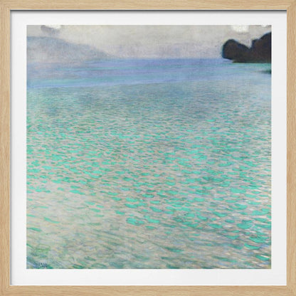 An impressionist painting by Gustav Klimt, in a light wood frame, depicting a serene body of water. The surface shimmers with countless dabs of bright turquoise and light blue paint, creating a textured, sparkling effect. In the distance, a hazy shoreline sits under a muted, overcast sky. Decor