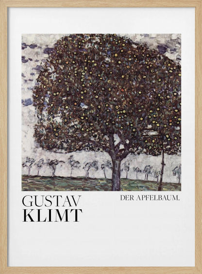A framed art print of Gustav Klimt's painting 'Der Apfelbaum' (The Apple Tree). The impressionist-style painting depicts a large, full apple tree with a dark, textured canopy dotted with small yellow apples, set against a pale sky and a green meadow. Artwork