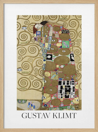 A framed art print of Gustav Klimt's painting 'Fulfillment,' featuring a stylized couple embracing. They are enveloped in ornate, patterned robes with geometric and circular motifs, set against a golden background with swirling patterns. The artist's name, 'GUSTAV KLIMT,' is printed below the image. Wall Art
