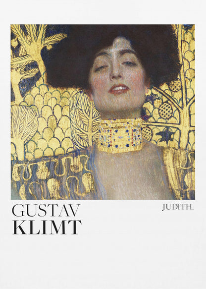 A framed art print of Gustav Klimt's painting 'Judith I'. The artwork features a portrait of a woman with dark hair and a gold choker against a lavish gold-leaf background. The artist's name and the title 'JUDITH.' are printed below the image on a white border. Print