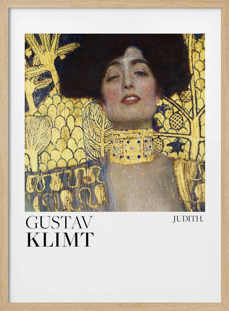 A framed art print of Gustav Klimt's painting 'Judith I'. The artwork features a portrait of a woman with dark hair and a gold choker against a lavish gold-leaf background. The artist's name and the title 'JUDITH.' are printed below the image on a white border. Print