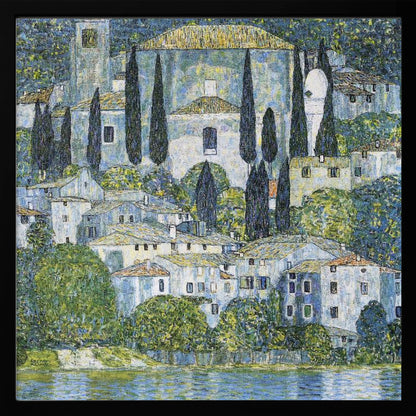 A framed art print of Gustav Klimt's 'Church in Cassone,' featuring a dense, colorful depiction of a hillside village by a lake. The scene is filled with white-walled houses, tall cypress trees, and lush greenery, all painted in a distinctive, textured, mosaic-like style with dominant blues, greens, and yellows. Decor