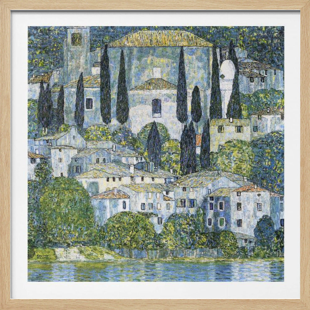 A framed art print of Gustav Klimt's 'Church in Cassone,' featuring a dense, colorful depiction of a hillside village by a lake. The scene is filled with white-walled houses, tall cypress trees, and lush greenery, all painted in a distinctive, textured, mosaic-like style with dominant blues, greens, and yellows. Decor