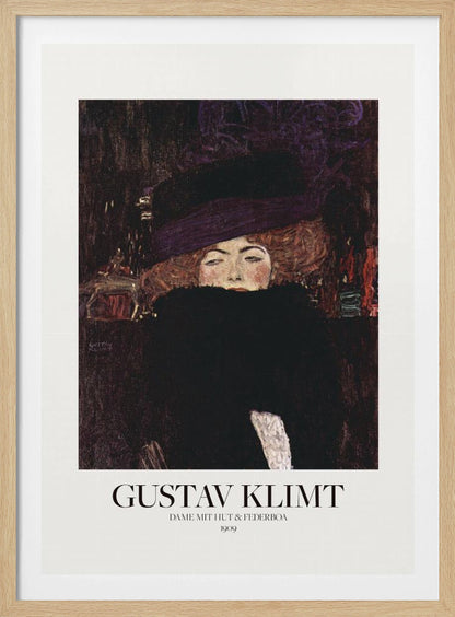 A framed art print of Gustav Klimt's 1909 painting, 'Lady with Hat and Feather Boa'. It features a portrait of a woman with auburn hair, a large purple hat, and a black feather boa obscuring her mouth, set against a dark, textured background. Poster