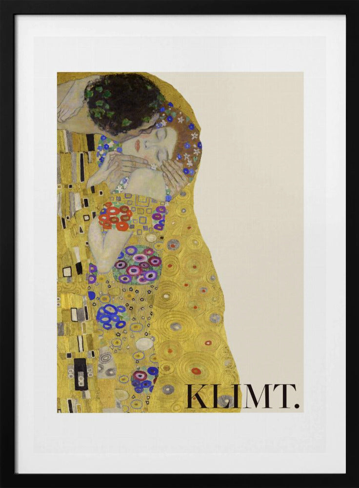 A framed art print of Gustav Klimt's 'The Kiss'. A couple embraces in ornate golden robes against a shimmering gold background. The poster includes the artist's name 'KLIMT.' in the lower right. Decor