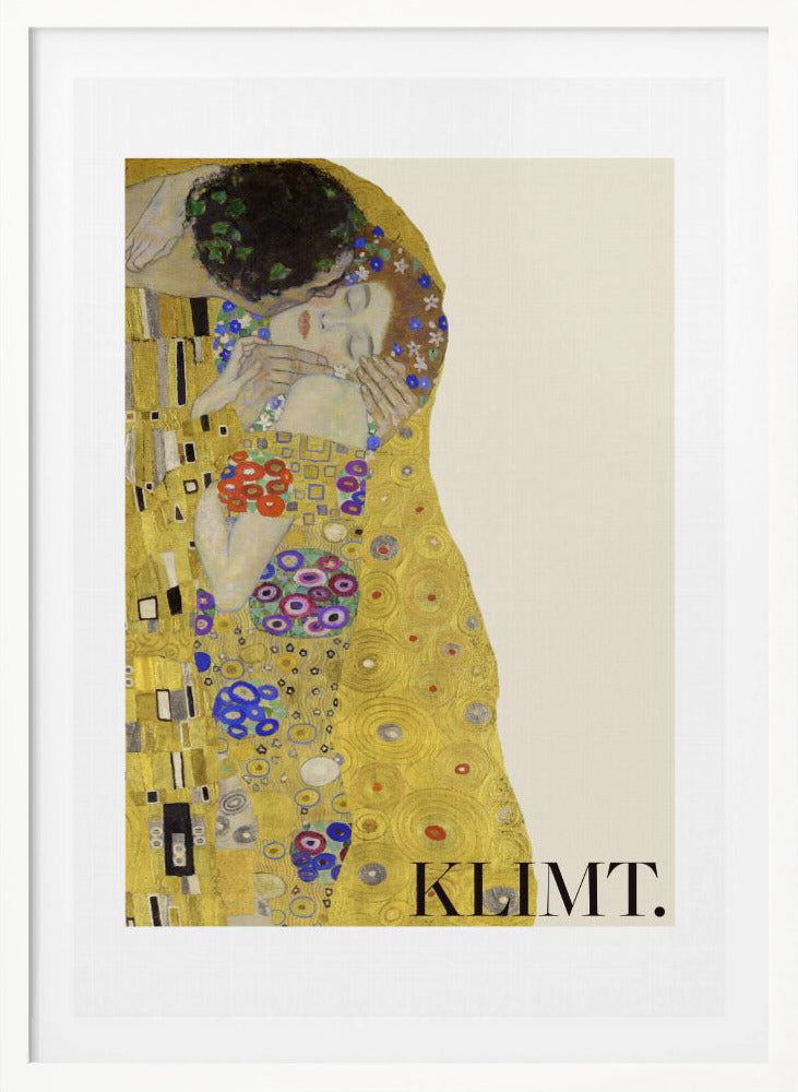 A framed art print of Gustav Klimt's 'The Kiss'. A couple embraces in ornate golden robes against a shimmering gold background. The poster includes the artist's name 'KLIMT.' in the lower right. Decor