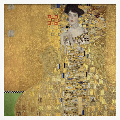 A framed print of Gustav Klimt's 'Portrait of Adele Bloch-Bauer I,' also known as 'The Woman in Gold.' The painting depicts a woman in an ornate, gilded gown covered in intricate patterns, blending into a shimmering gold background characteristic of the Art Nouveau style. Poster