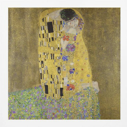 A framed print of Gustav Klimt's famous painting, 'The Kiss'. It features a couple in a passionate embrace, adorned in ornate, patterned golden robes. They are kneeling on a vibrant bed of flowers against a shimmering, textured gold background. Print