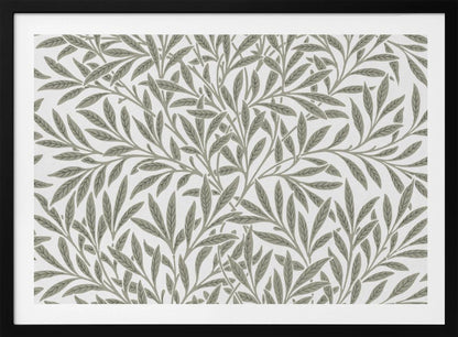 A framed art print displaying a dense pattern of sage green leaves and branches on a white background. The design is continuous and has a calm, naturalistic feel, enclosed within a simple silver frame. Artwork