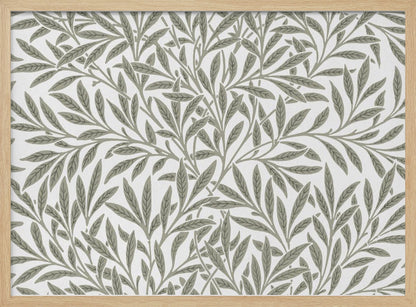 A framed art print displaying a dense pattern of sage green leaves and branches on a white background. The design is continuous and has a calm, naturalistic feel, enclosed within a simple silver frame. Artwork