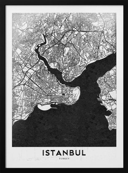 A modern black and white framed poster of a city map of Istanbul. The land is depicted in white with intricate black lines representing streets, while the bodies of water like the Bosphorus are shown in solid textured black. A white banner at the bottom displays the word 'ISTANBUL' in a bold, black, sans-serif font. Artwork