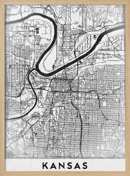 A modern, black and white line-art map of Kansas City, displayed in a black frame. The map details the intricate grid of streets and the winding path of a major river. At the bottom, a white border contains the word 'KANSAS' in bold, black capital letters. Artwork