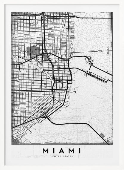 A minimalist black and white street map of Miami, Florida, with a distressed, textured background. The map is framed in black with the word 'MIAMI' printed in bold capital letters at the bottom. Artwork