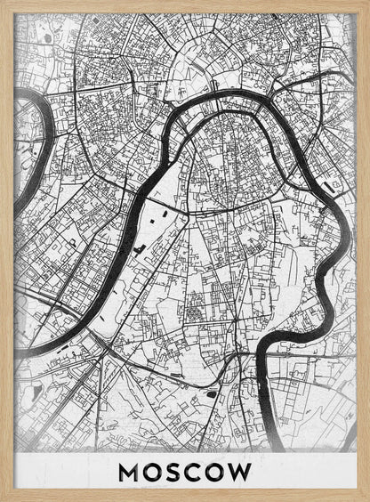 A framed, minimalist black and white street map of Moscow, Russia. The map details the intricate road network and the winding Moskva River. The word 'MOSCOW' is printed in large, black capital letters at the bottom. Print