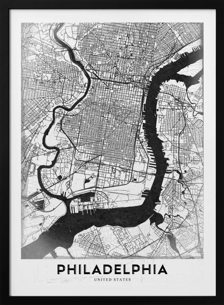 A modern black and white framed poster of a city map of Philadelphia. The map details the street grid, with the Schuylkill and Delaware rivers prominently featured in solid black. The word 'PHILADELPHIA' is printed in a bold, black sans-serif font at the bottom. Artwork