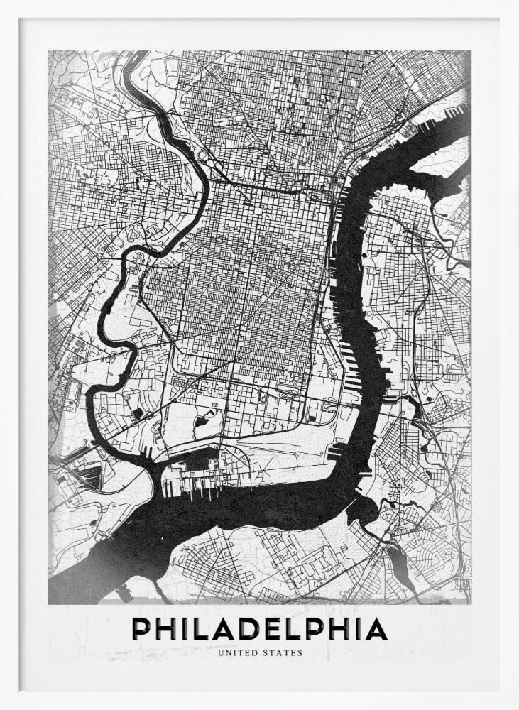 A modern black and white framed poster of a city map of Philadelphia. The map details the street grid, with the Schuylkill and Delaware rivers prominently featured in solid black. The word 'PHILADELPHIA' is printed in a bold, black sans-serif font at the bottom. Artwork