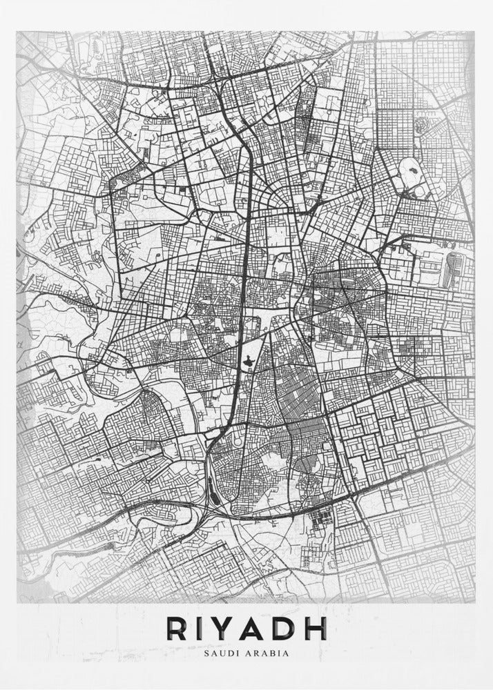 A minimalist, black and white framed poster of a city map of Riyadh. The map details the intricate network of streets and city blocks in black lines on a textured, light gray background. At the bottom, the word 'RIYADH' is printed in a bold, black, sans-serif font. Wall Art