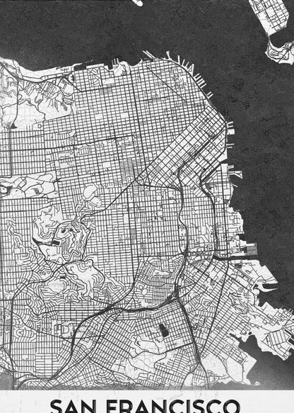 A minimalist black and white art print of a San Francisco city map. The street grid and landmass are depicted in white with fine black lines, set against a solid black background representing the water. A black frame surrounds the map, and a white banner at the bottom displays the text 'SAN FRANCISCO' in a bold, black font. Wall Art
