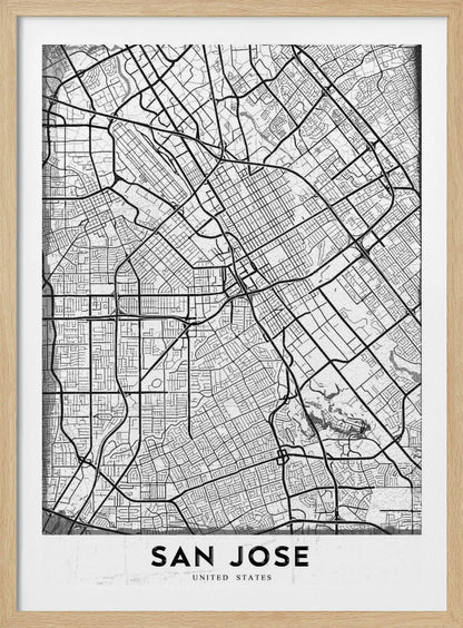 A minimalist black and white street map of San Jose, California, presented as a framed poster. The map details the city's grid, highways, and roads in black lines on a slightly textured white background. The text 'SAN JOSE' is written in a bold, black, sans-serif font at the bottom. Wall Art