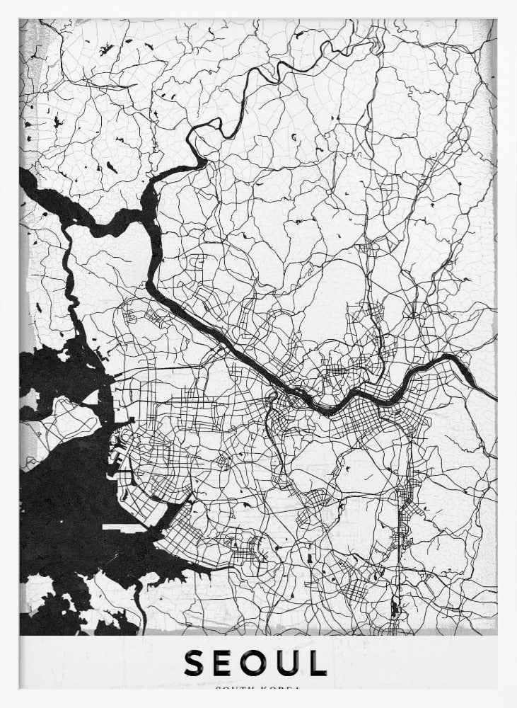 A minimalist black and white map of Seoul, South Korea, showing the city's intricate network of roads and the Han River. The map is presented in a modern, artistic style with a simple black frame and the word 'SEOUL' in bold capital letters at the bottom. Decor