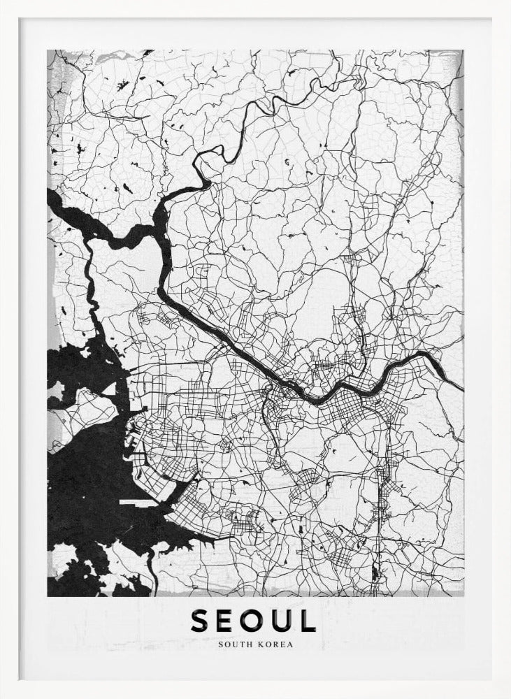 A minimalist black and white map of Seoul, South Korea, showing the city's intricate network of roads and the Han River. The map is presented in a modern, artistic style with a simple black frame and the word 'SEOUL' in bold capital letters at the bottom. Decor
