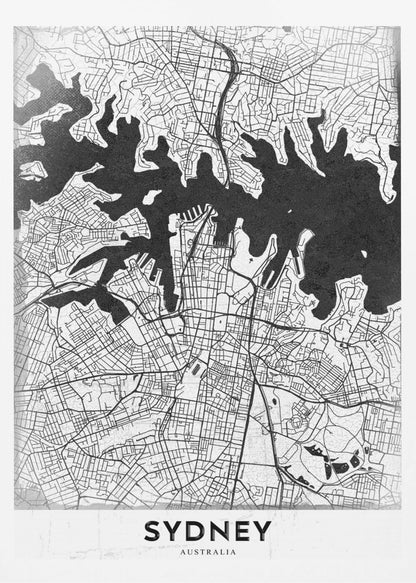 A modern black and white framed art print of a city map of Sydney, Australia. The water bodies are shown in solid textured black, while the land is depicted with a detailed white street grid. At the bottom, the word 'SYDNEY' is printed in bold capital letters. Poster