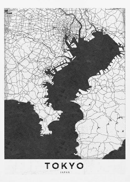 A minimalist black and white map of Tokyo, Japan, in a black frame. The map shows the city's road network in thin black lines on a white background, while Tokyo Bay and other water bodies are depicted in solid black. A white banner at the bottom contains the word 'TOKYO' in a clean, sans-serif font. Wall Art
