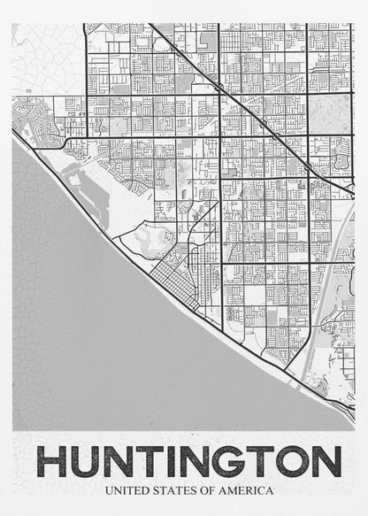 A minimalist black and white framed map of Huntington. The map details the city's street grid next to the coastline, with the name 'HUNTINGTON' printed in bold block letters at the bottom. Print