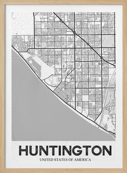 A minimalist black and white framed map of Huntington. The map details the city's street grid next to the coastline, with the name 'HUNTINGTON' printed in bold block letters at the bottom. Print